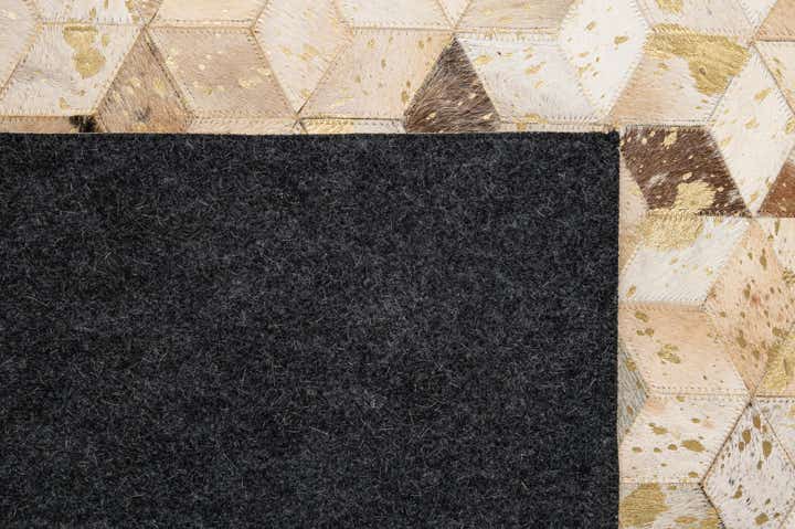 5' 3 x 8' 1 Cowhide - Patchwork Rug
