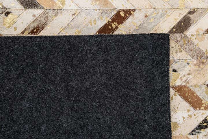 5' 2 x 7' 11 Cowhide - Patchwork Rug