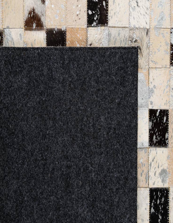 Detail image of 5' x 7' 11 Cowhide - Patchwork Rug