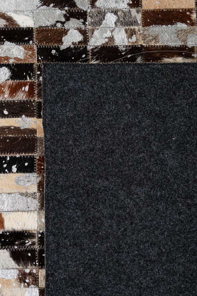 5' 2 x 7' 11 Cowhide - Patchwork Rug