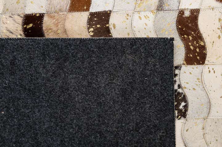 5' 1 x 7' 11 Cowhide - Patchwork Rug