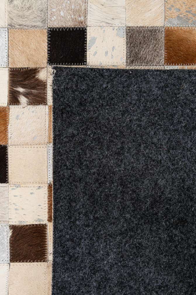 5' 1 x 7' 11 Cowhide - Patchwork Rug