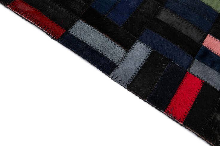 Detail image of 5' 1 x 7' 11 Cowhide - Patchwork Rug
