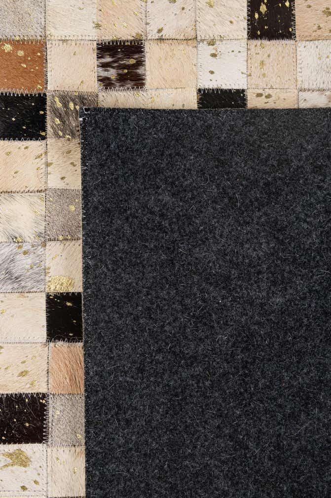 5' 2 x 7' 11 Cowhide - Patchwork Rug