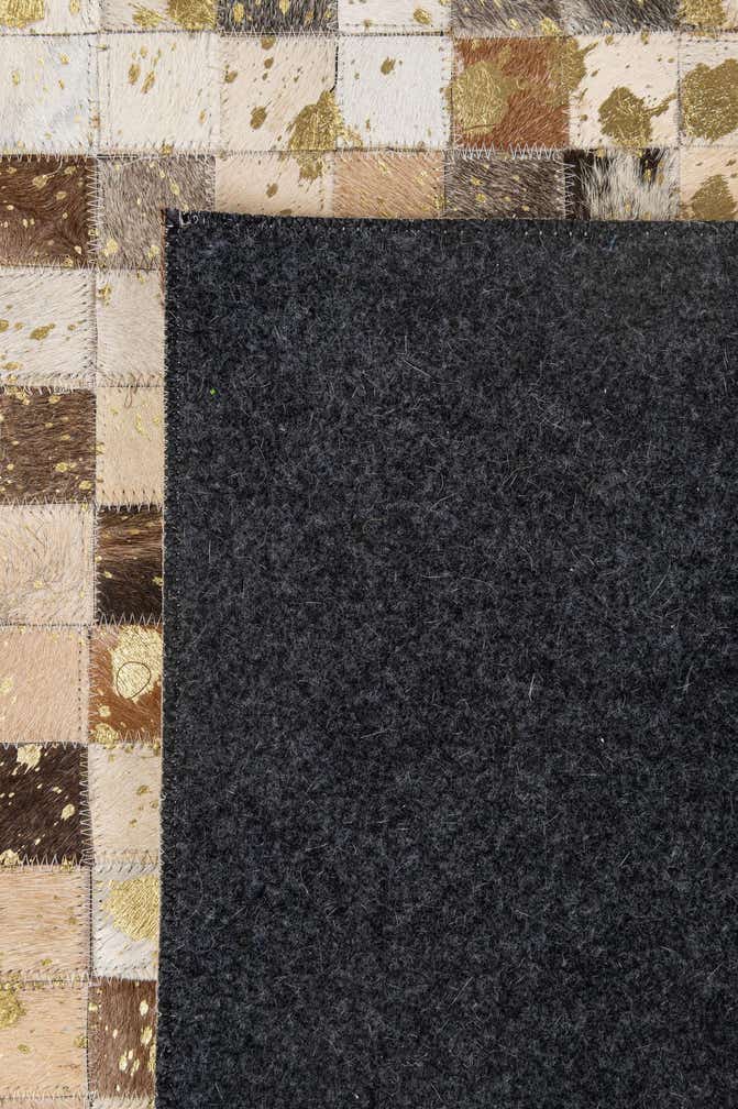 5' 1 x 7' 10 Cowhide - Patchwork Rug