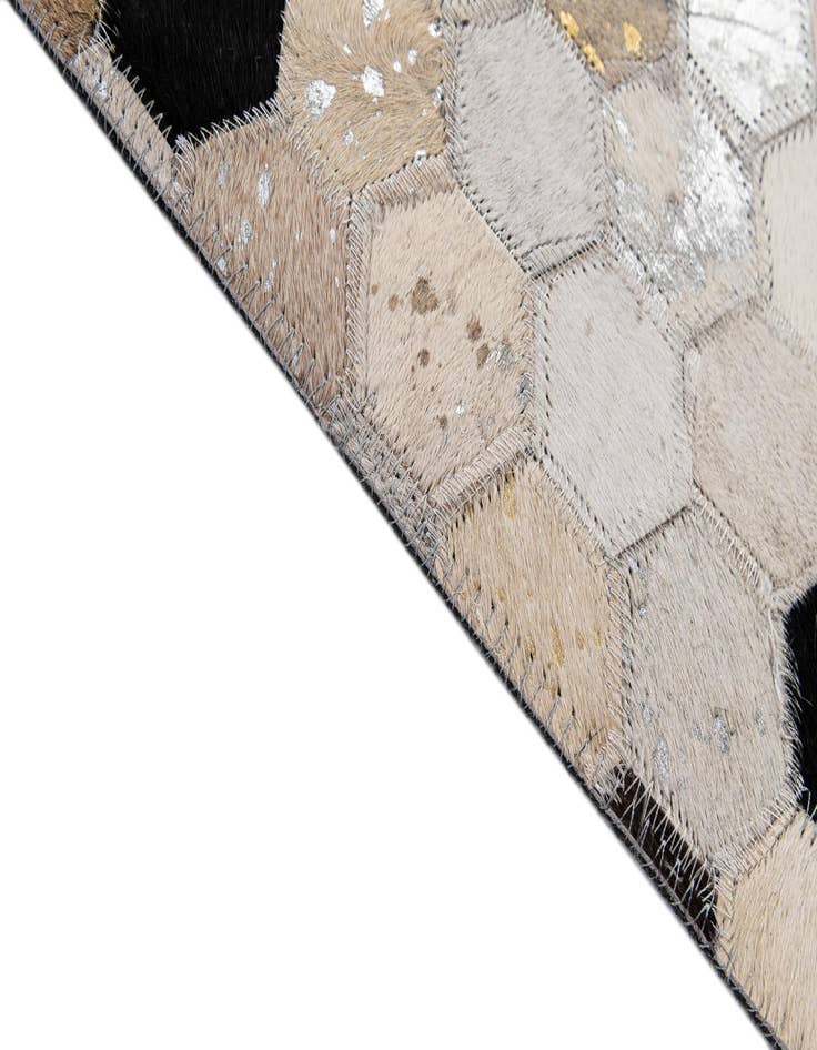 Detail image of 4' 11 x 7' 9 Cowhide - Patchwork Rug