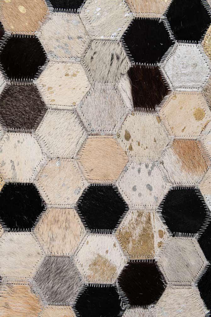 4' 11 x 7' 9 Cowhide - Patchwork Rug