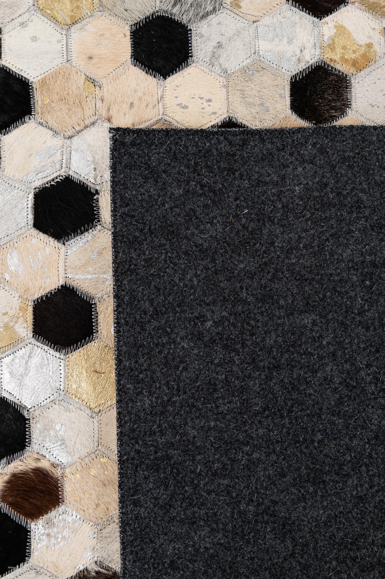 4' 11 x 7' 9 Cowhide - Patchwork Rug