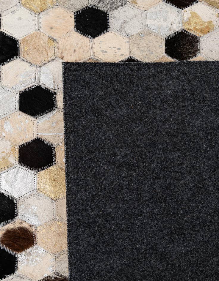 Detail image of 4' 11 x 7' 9 Cowhide - Patchwork Rug