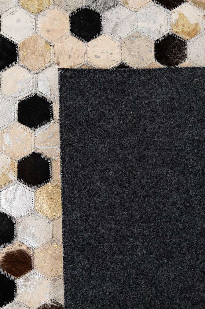 4' 11 x 7' 9 Cowhide - Patchwork Rug