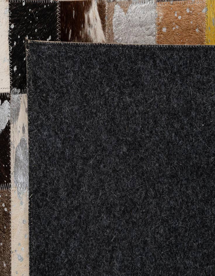 Detail image of 5' 1 x 8' Cowhide - Patchwork Rug