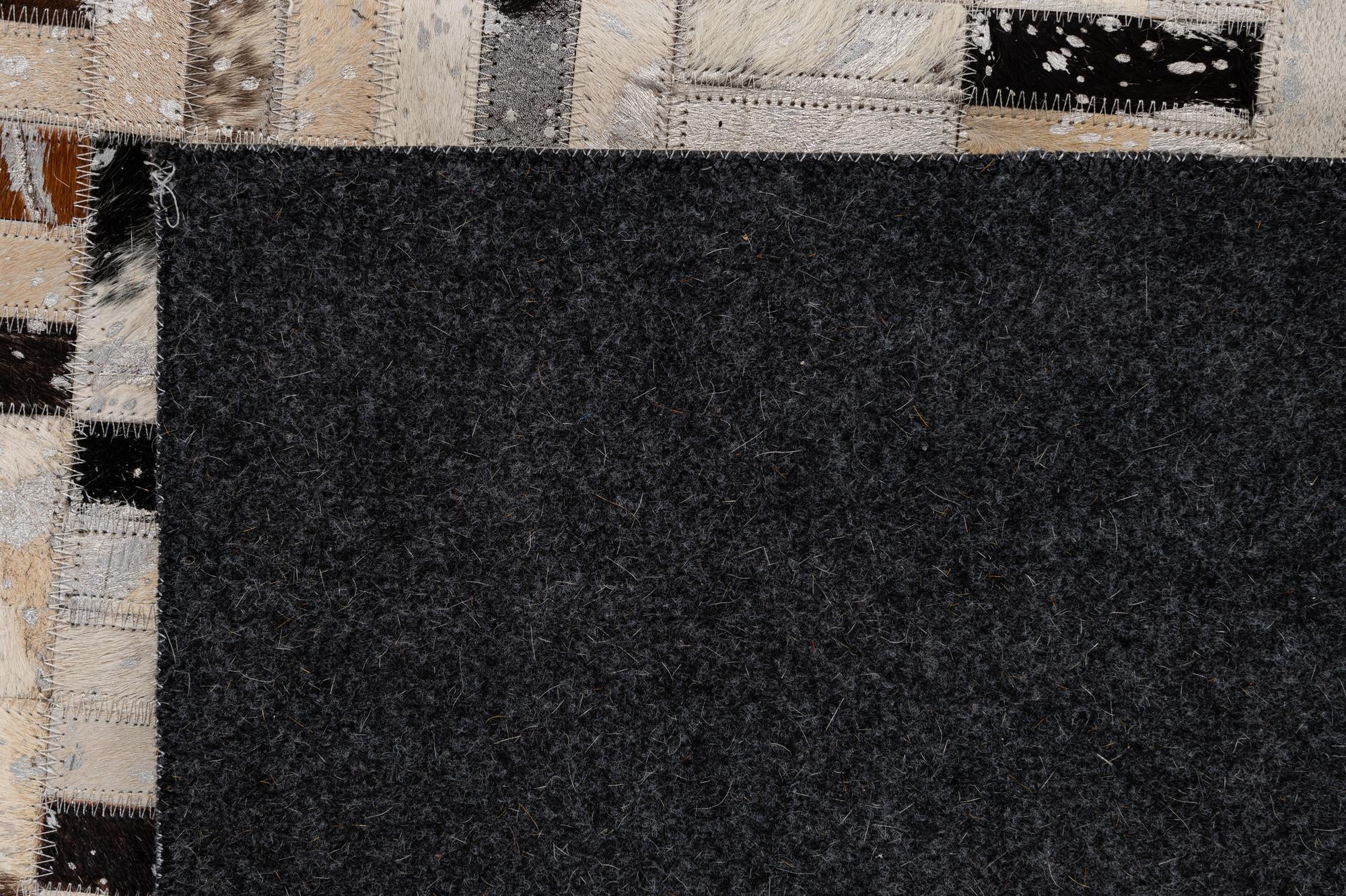 4' 11 x 7' 11 Cowhide - Patchwork Rug