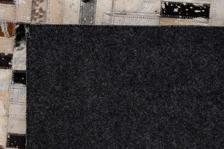 4' 11 x 7' 11 Cowhide - Patchwork Rug