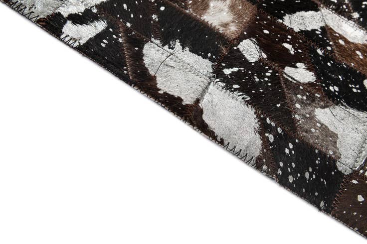 Detail image of 5' 1 x 7' 11 Cowhide - Patchwork Rug