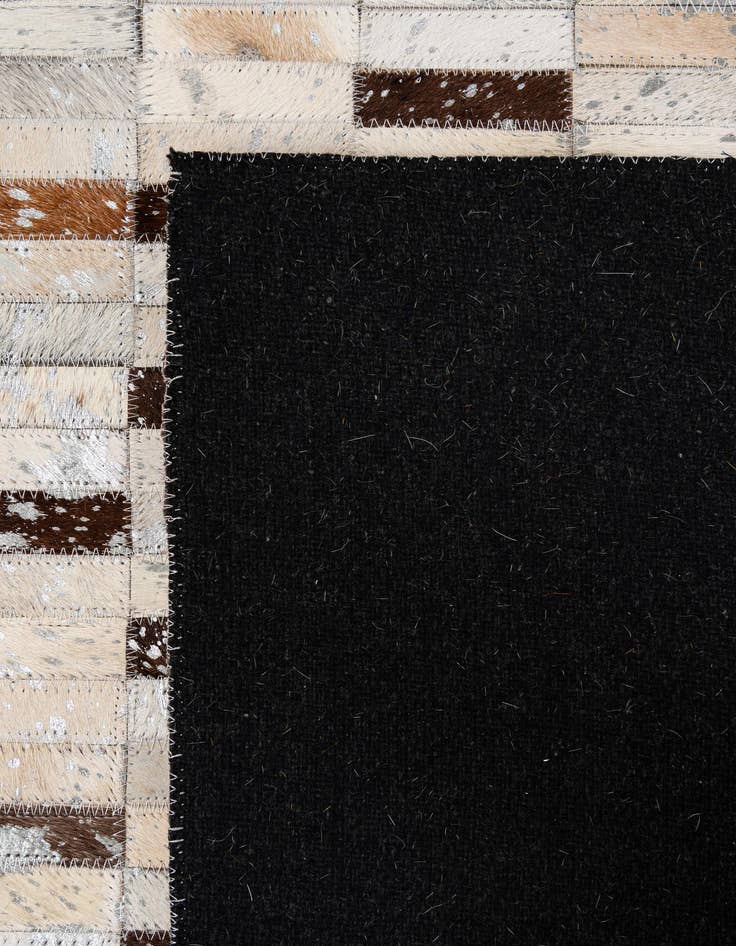 Detail image of 5' 1 x 8' Cowhide - Patchwork Rug