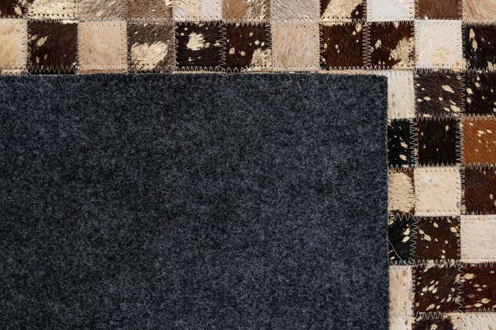 5' 1 x 7' 10 Cowhide - Patchwork Rug