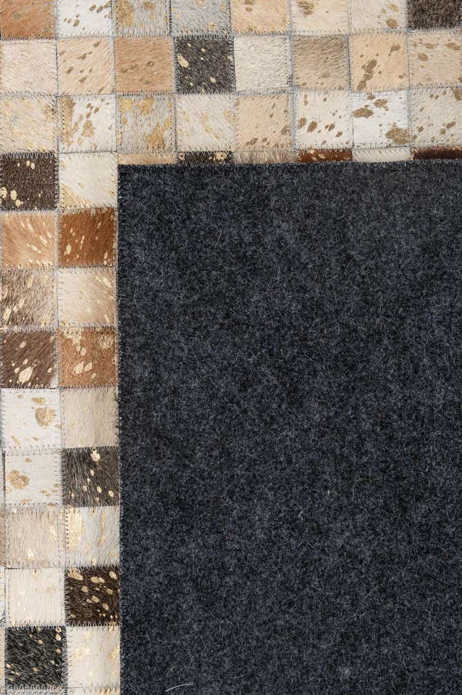 5' 2 x 8' 1 Cowhide - Patchwork Rug