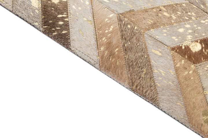 5' 2 x 8' 1 Cowhide - Patchwork Rug