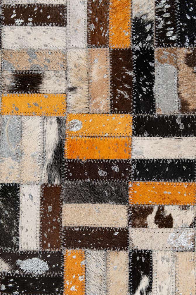 4' 11 x 7' 10 Cowhide - Patchwork Rug