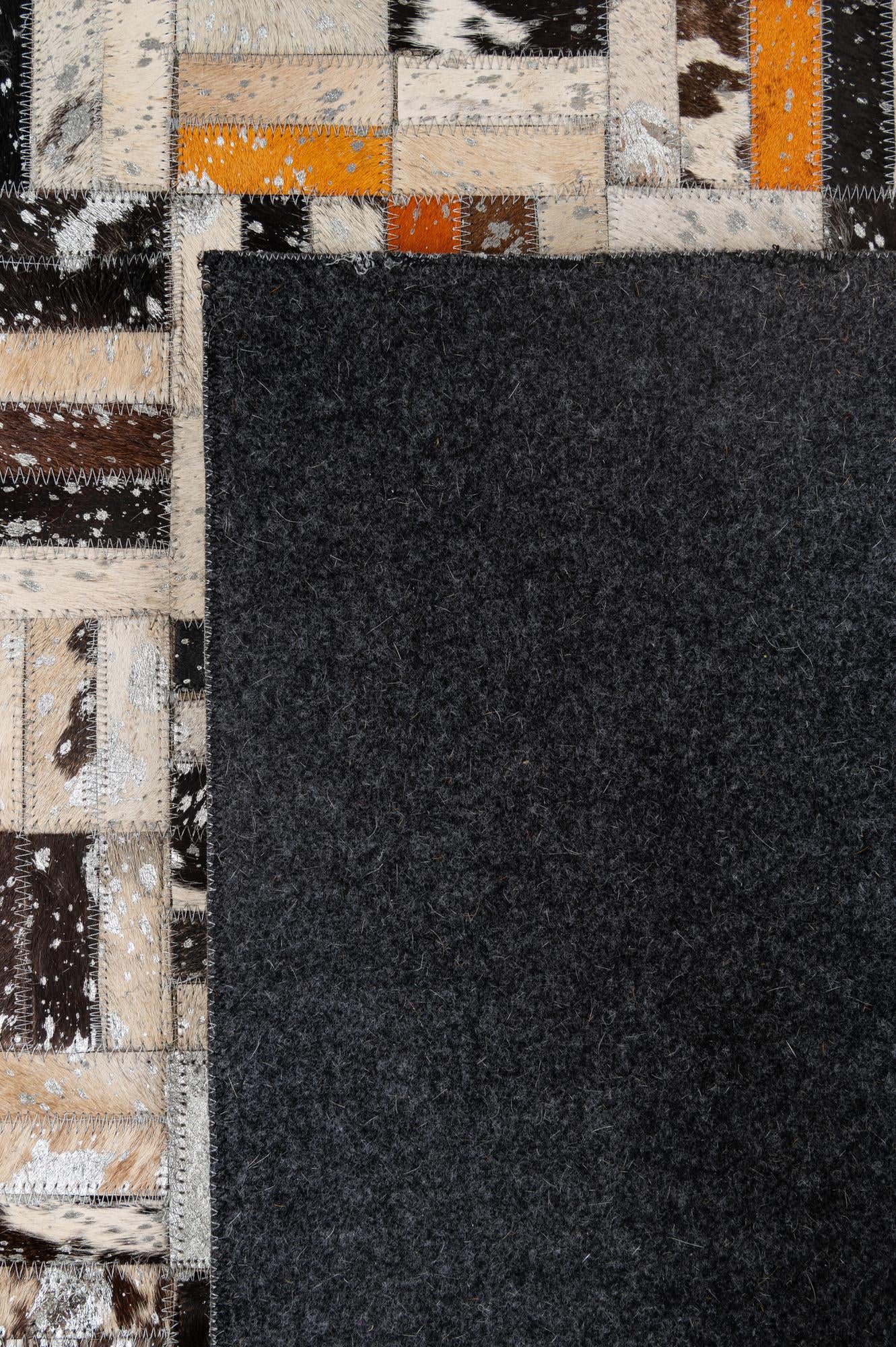 4' 11 x 7' 10 Cowhide - Patchwork Rug