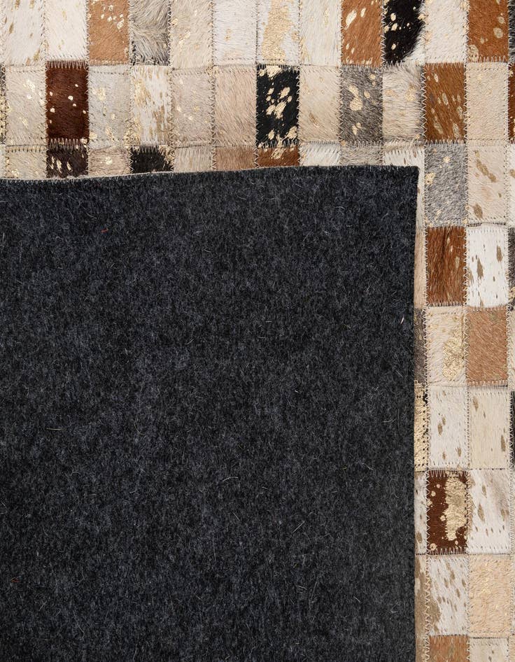 Detail image of 5' 1 x 8' 1 Cowhide - Patchwork Rug