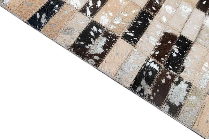 4' 11 x 7' 10 Cowhide - Patchwork Rug