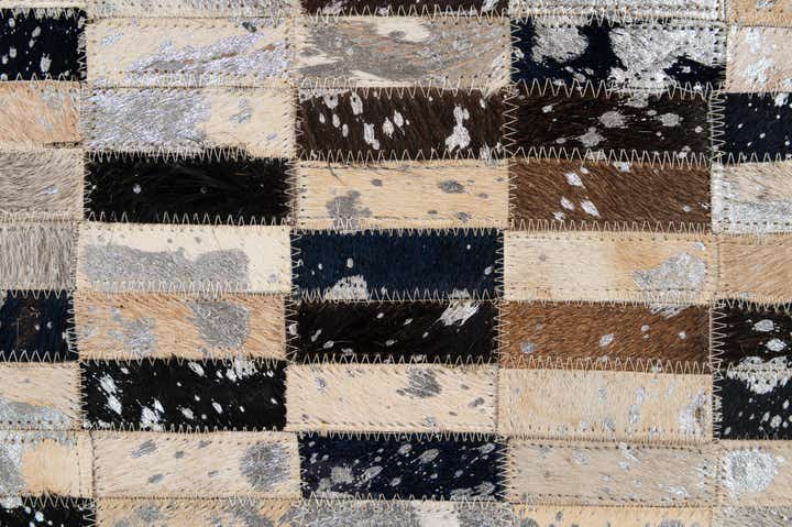 4' 11 x 7' 10 Cowhide - Patchwork Rug
