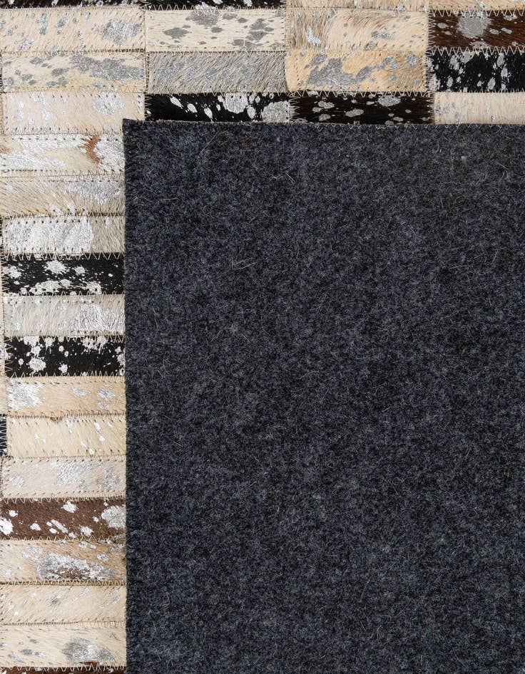 Detail image of 4' 11 x 7' 10 Cowhide - Patchwork Rug