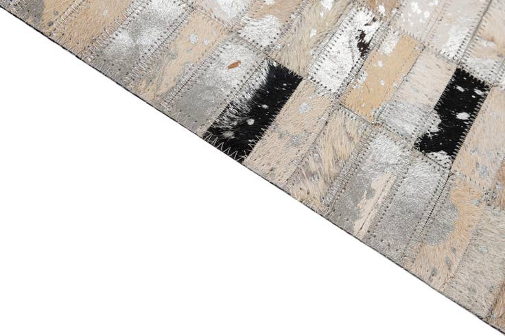 Detail image of 5' 3 x 8' 2 Cowhide - Patchwork Rug
