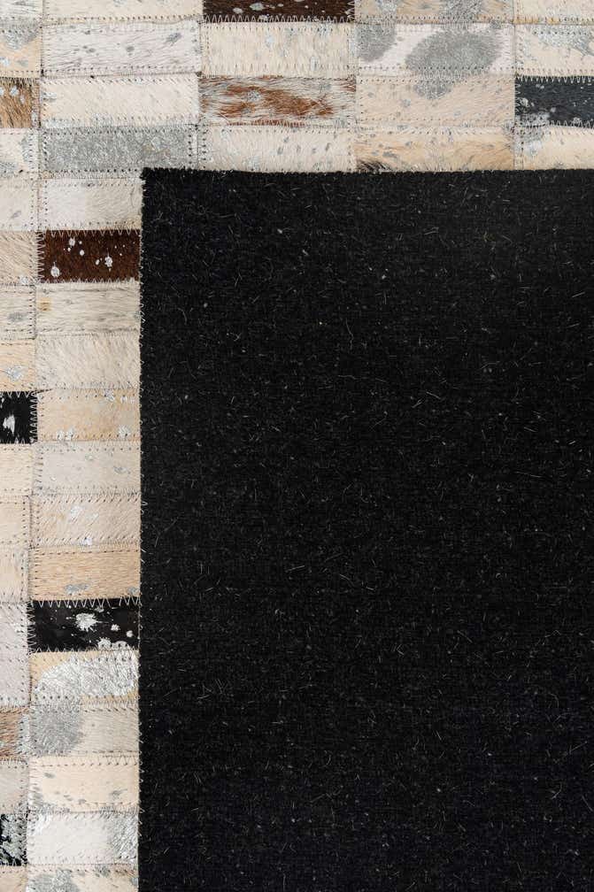 5' 3 x 8' 2 Cowhide - Patchwork Rug