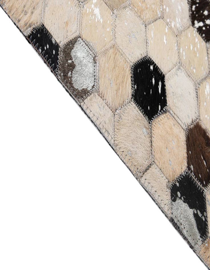 Detail image of 4' 11 x 7' 10 Cowhide - Patchwork Rug