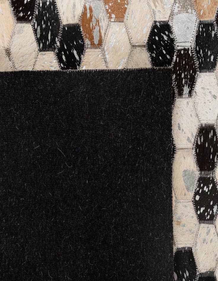 Detail image of 4' 11 x 7' 10 Cowhide - Patchwork Rug