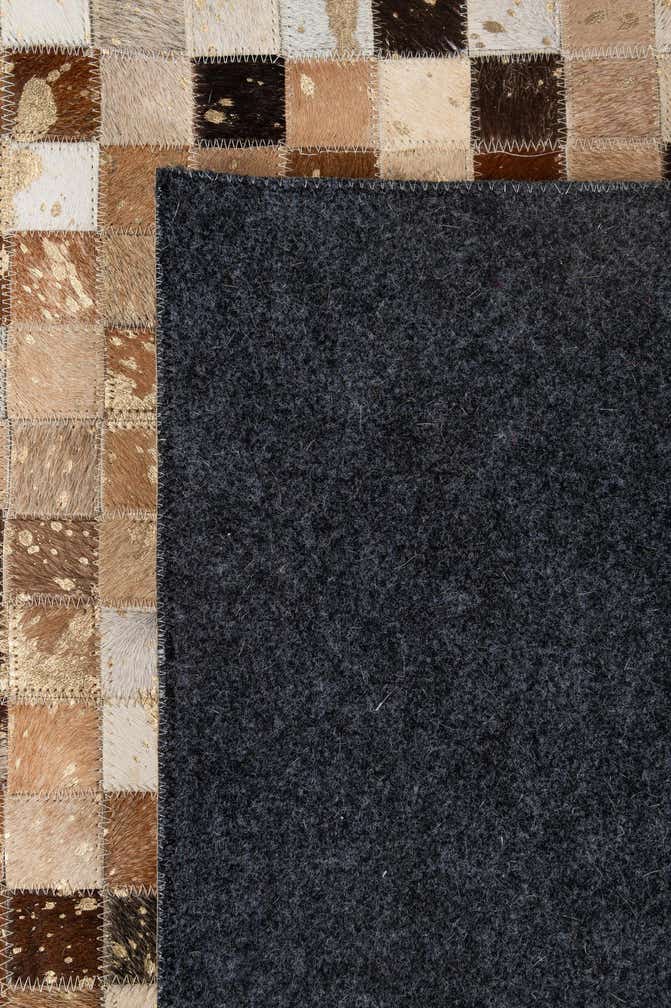 5' 1 x 7' 11 Cowhide - Patchwork Rug