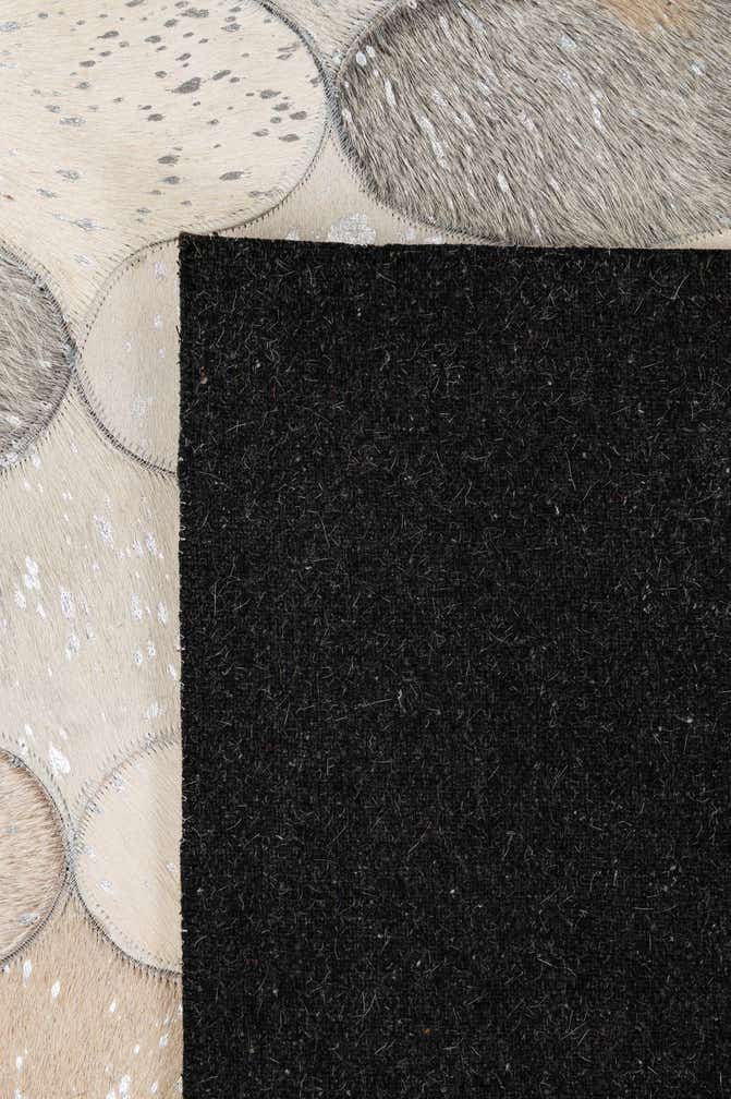 5' x 8' 3 Cowhide - Patchwork Rug