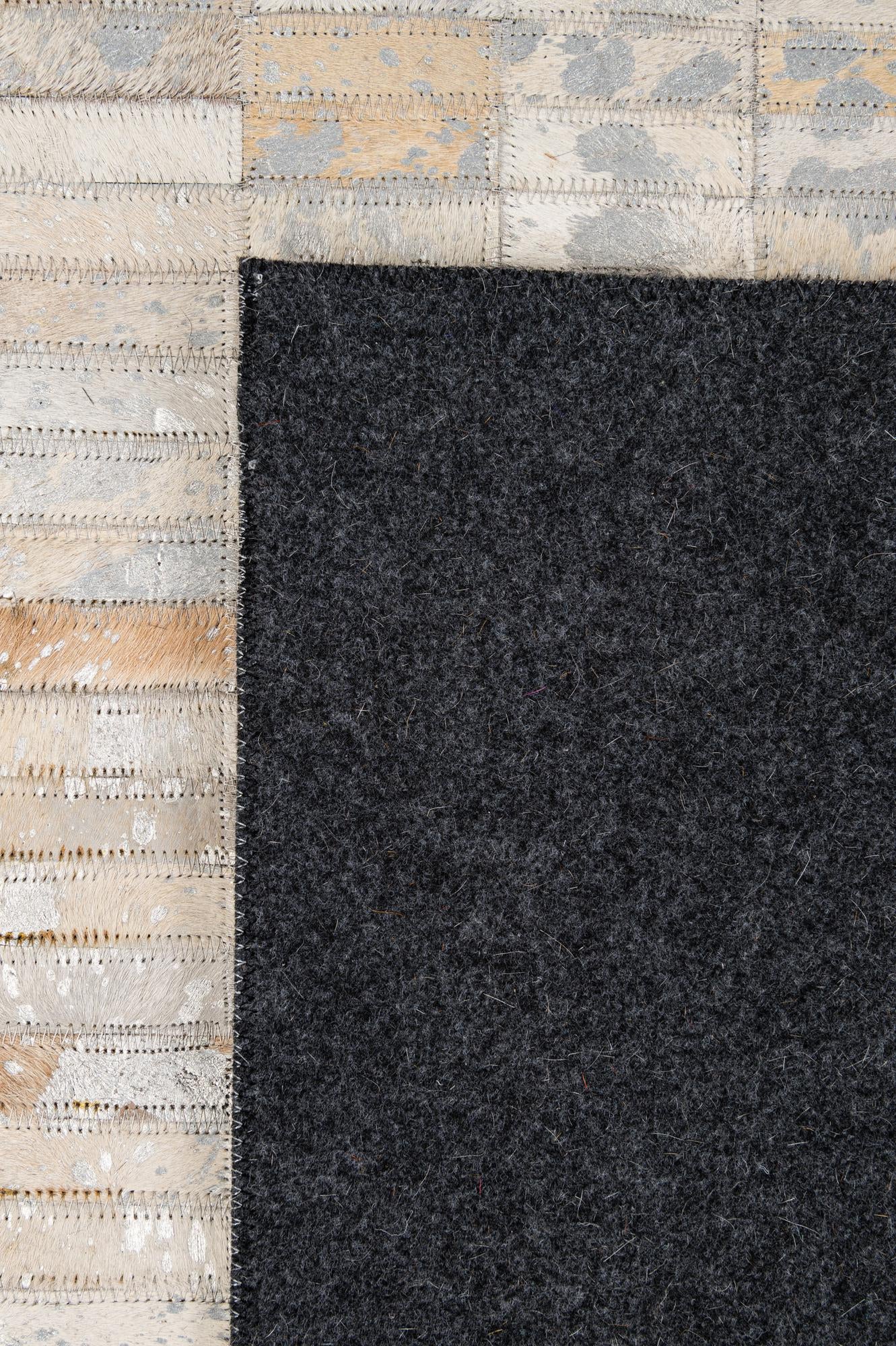 4' 11 x 7' 11 Cowhide - Patchwork Rug