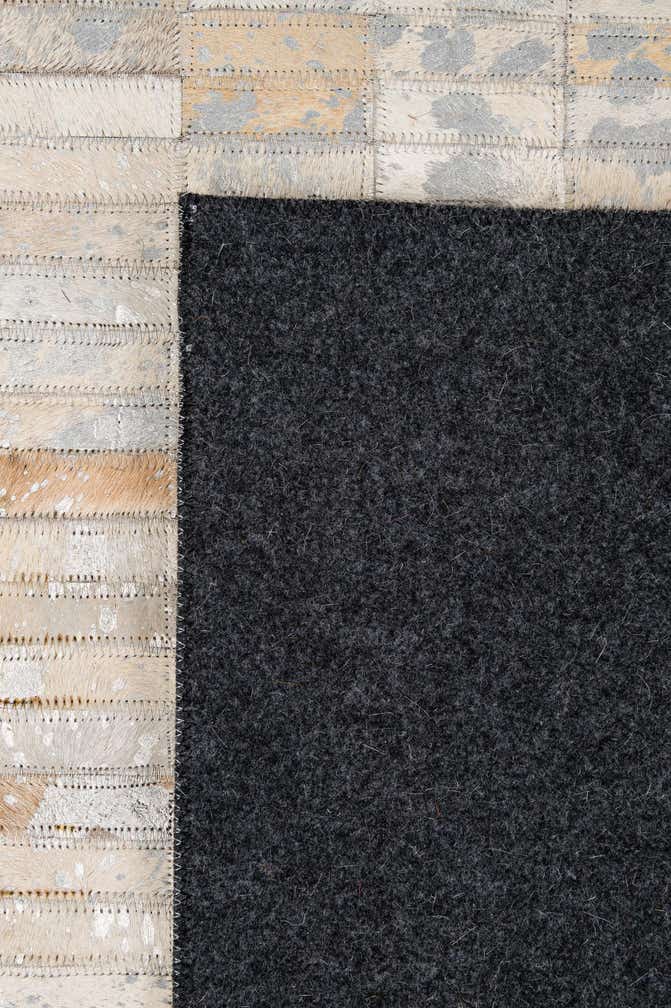 4' 11 x 7' 11 Cowhide - Patchwork Rug