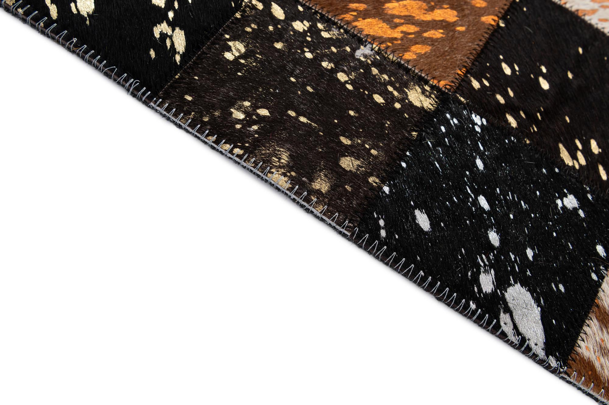 4' 11 x 7' 10 Cowhide - Patchwork Rug