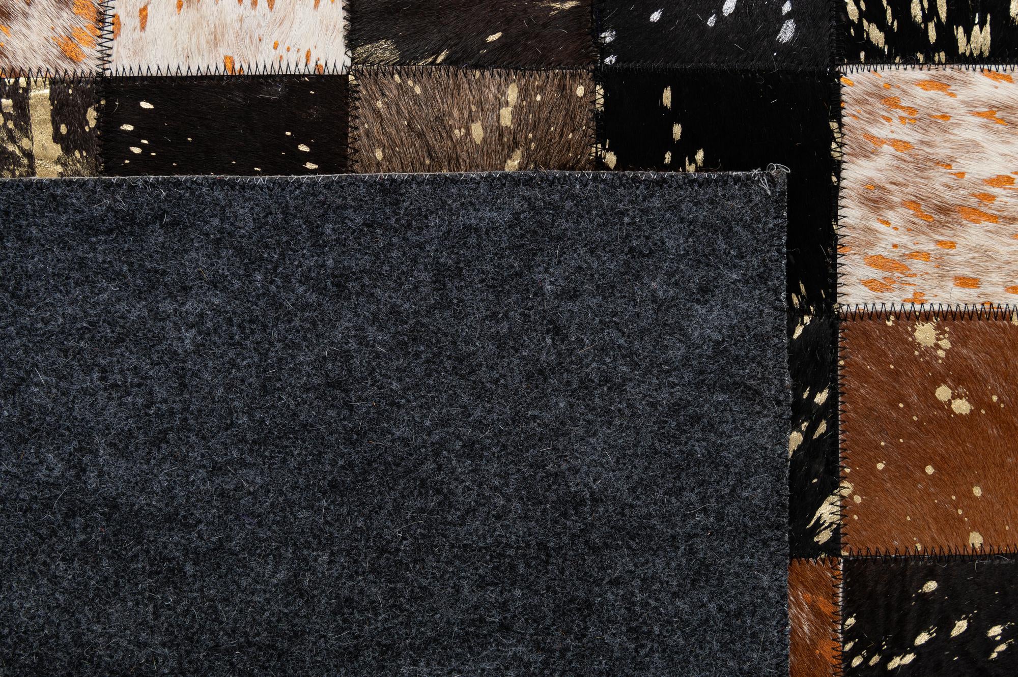 4' 11 x 7' 10 Cowhide - Patchwork Rug