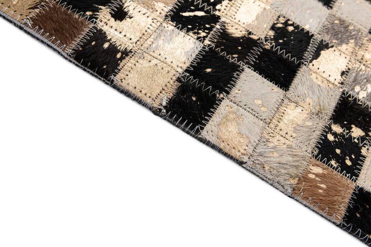 Detail image of 5' 1 x 8' Cowhide - Patchwork Rug