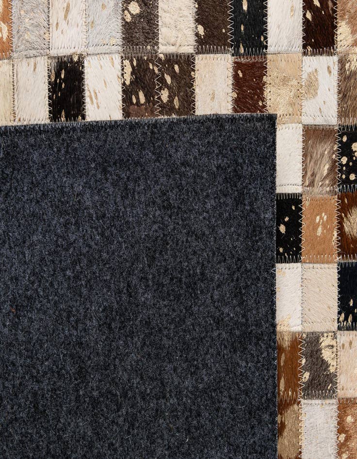 Detail image of 5' 1 x 8' Cowhide - Patchwork Rug