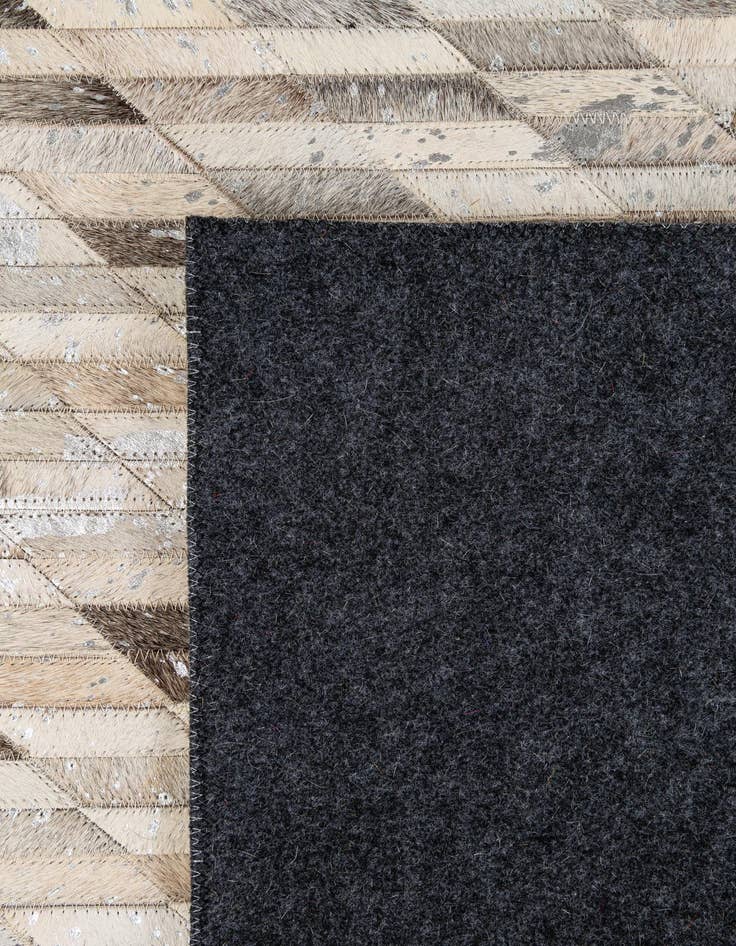 Detail image of 5' 1 x 7' 11 Cowhide - Patchwork Rug