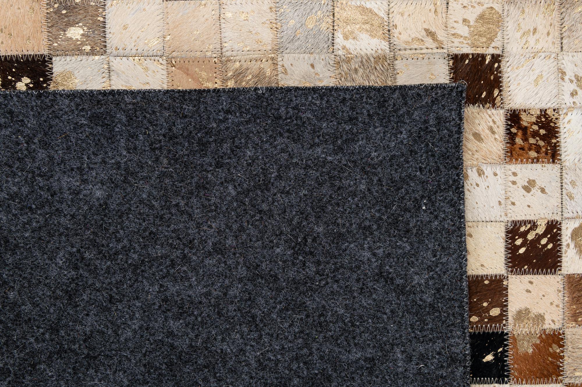 5' 2 x 8' 2 Cowhide - Patchwork Rug