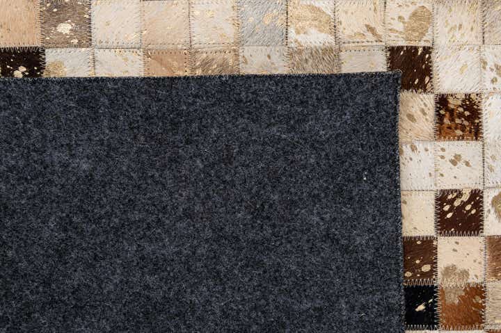 5' 2 x 8' 2 Cowhide - Patchwork Rug