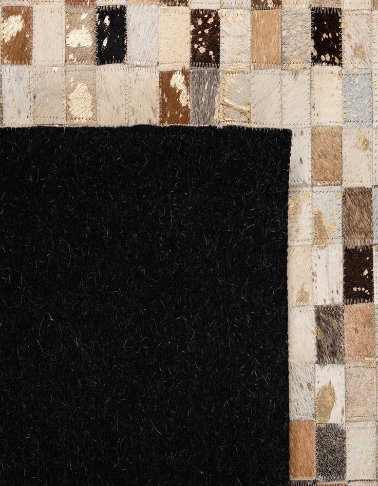 Detail image of 5' 2 x 8' 3 Cowhide - Patchwork Rug