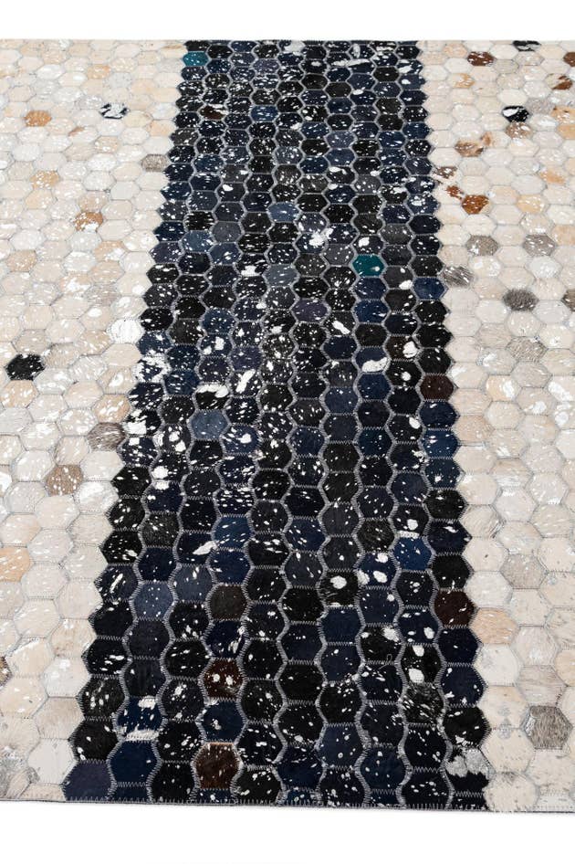 Detail image of 5' 1 x 7' 11 Cowhide - Patchwork Rug