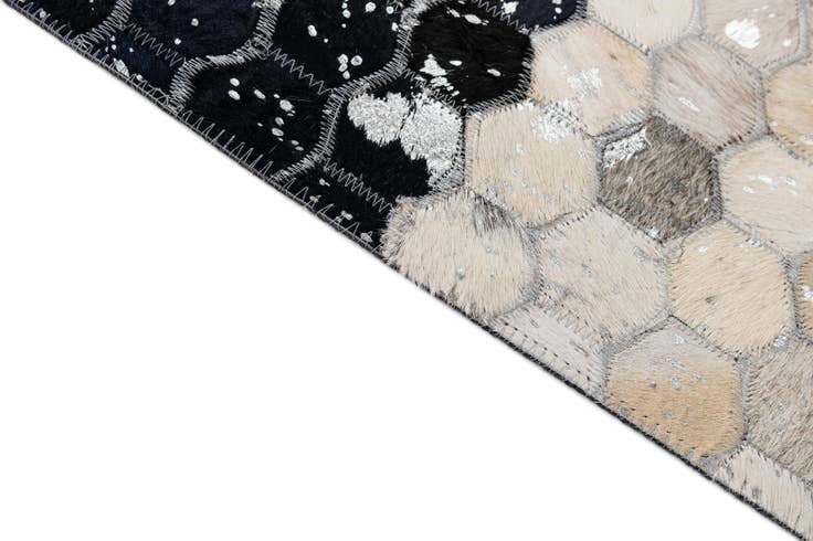 Detail image of 5' 1 x 7' 11 Cowhide - Patchwork Rug