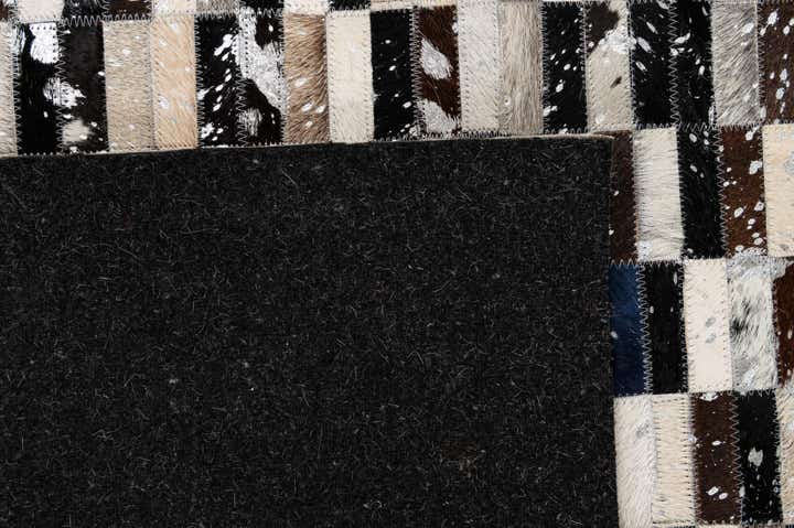 5' 3 x 8' 1 Cowhide - Patchwork Rug