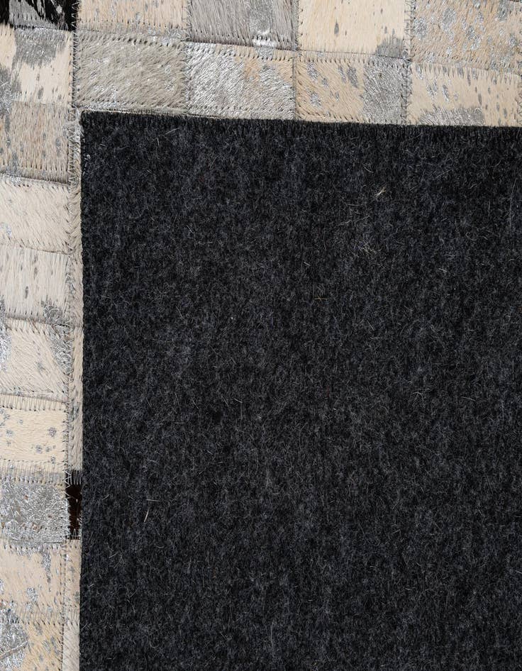 Detail image of 5' 1 x 8' 1 Cowhide - Patchwork Rug