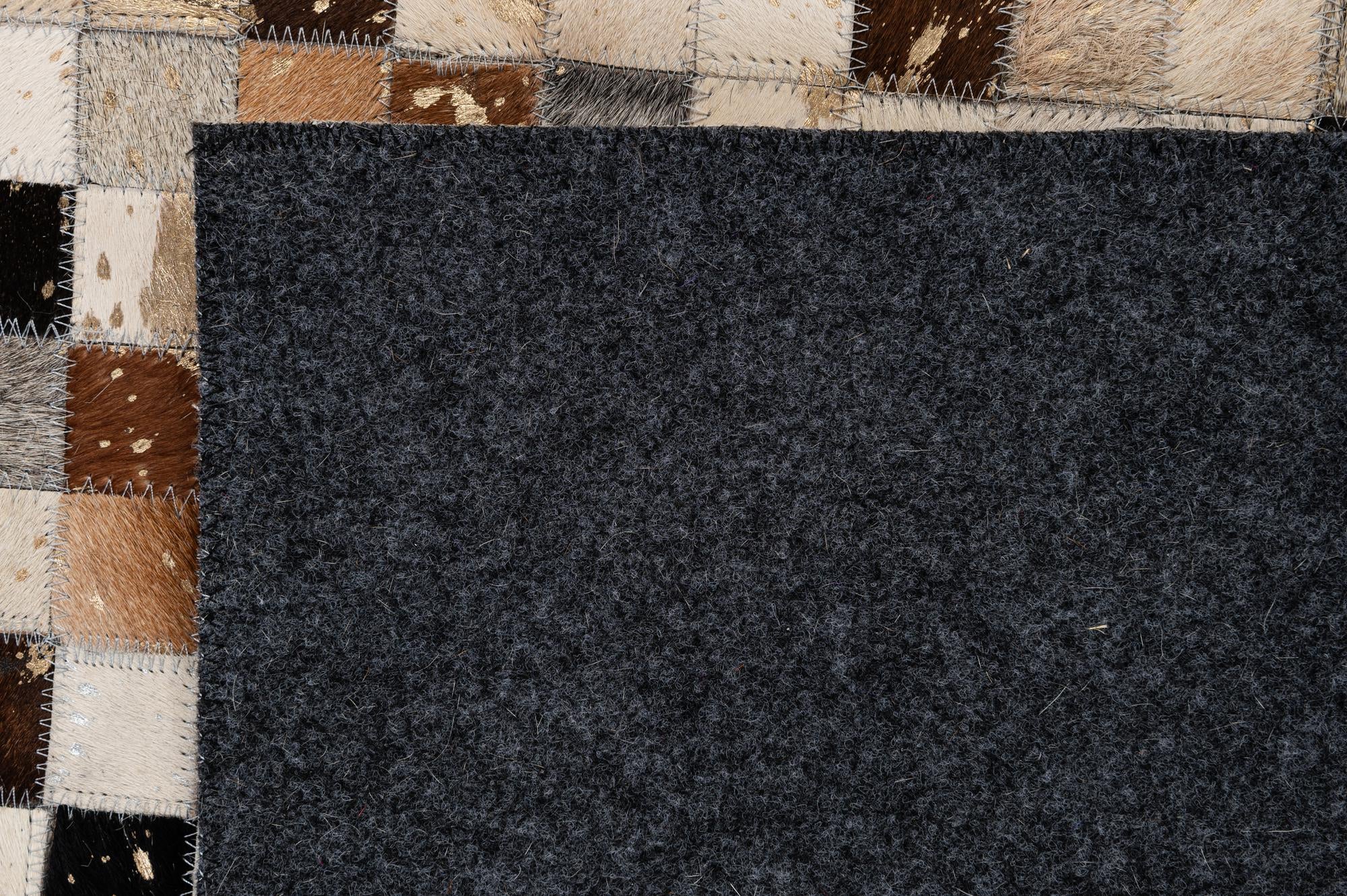 4' 11 x 7' 10 Cowhide - Patchwork Rug
