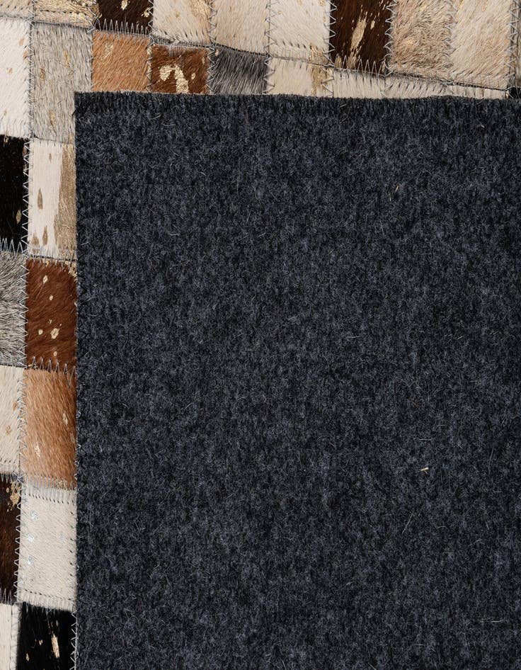Detail image of 4' 11 x 7' 10 Cowhide - Patchwork Rug